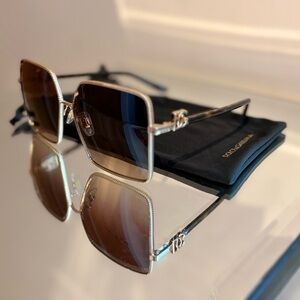 Dolce & Gabbana DG2279 square sunglasses with a gold-tone metal frame